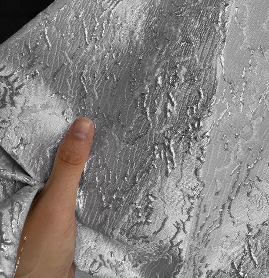 Silver water flow texture three-dimensional texture fabric irregular jacquard fabric skirt clothing designer fabric